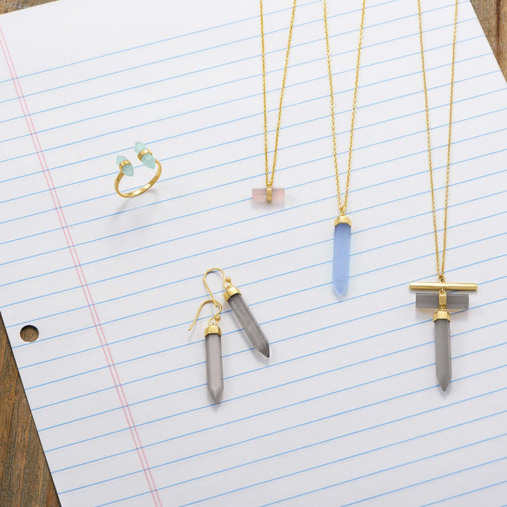 Earth Song Jewelry layout of gold sterling silver quartz and moonstone jewelry