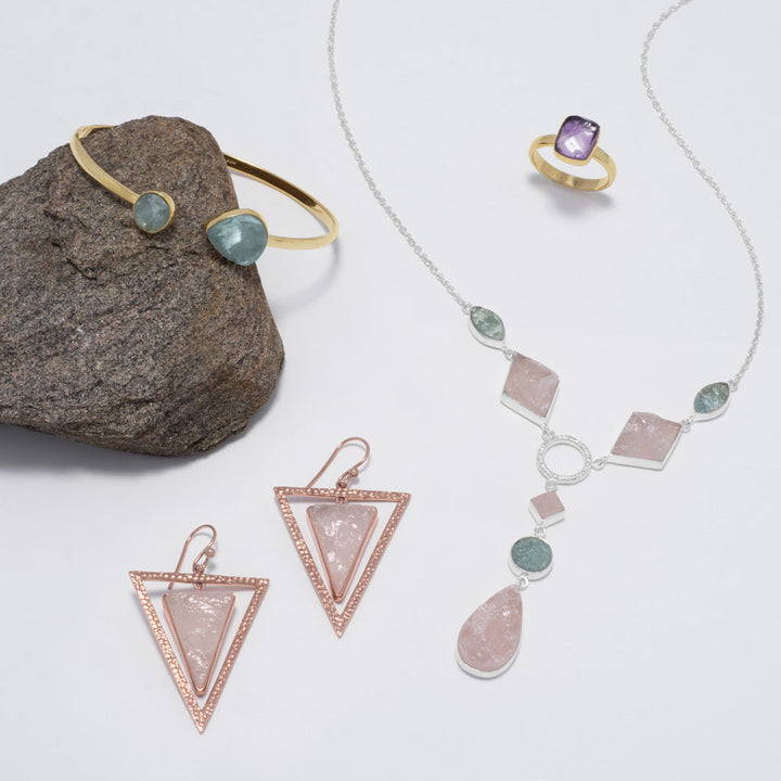 Earth Song Jewelry layout of rose quartz and aquamarine jewelry