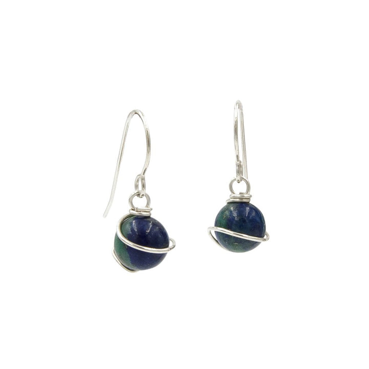 Earth Song Jewelry handmade Holding Earth Azurite earrings. Made with 925 sterling silver.