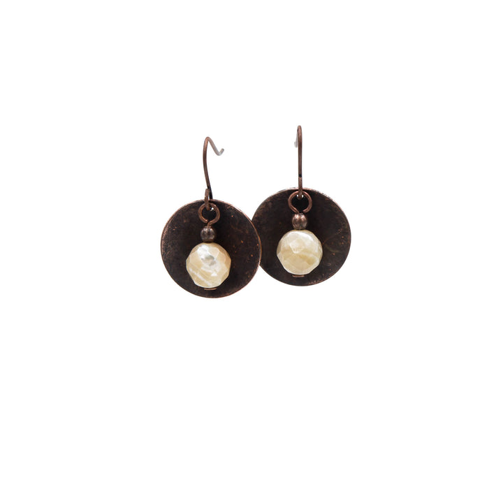 Earth Song Jewelry ~ Pearl earrings has iridescent areas, flashes and stripes of white and tan flakes for add dimension.