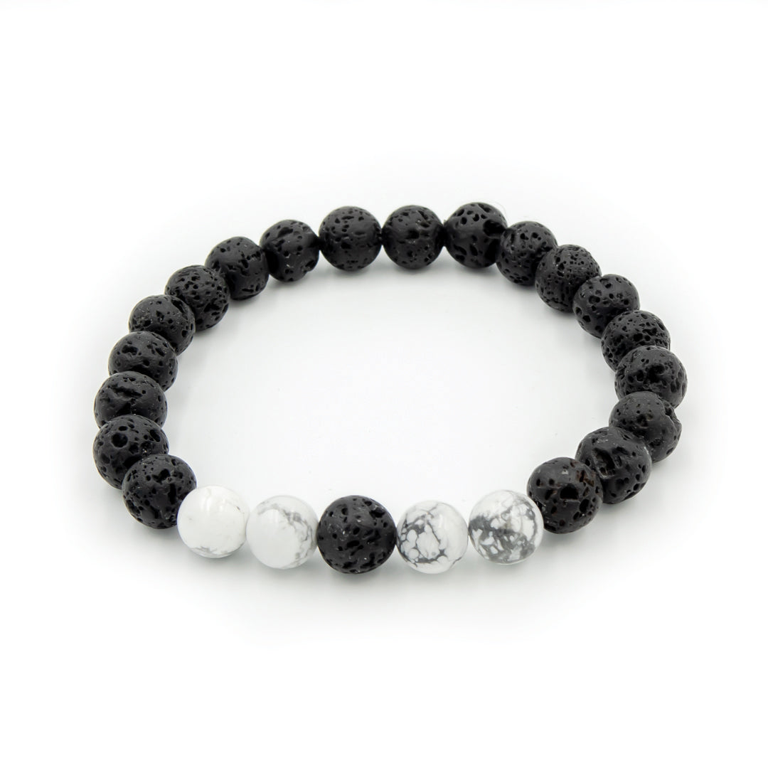 Earth Song Jewelry ~ Aromatherapy bracelet with natural Lava and Howlite stones.