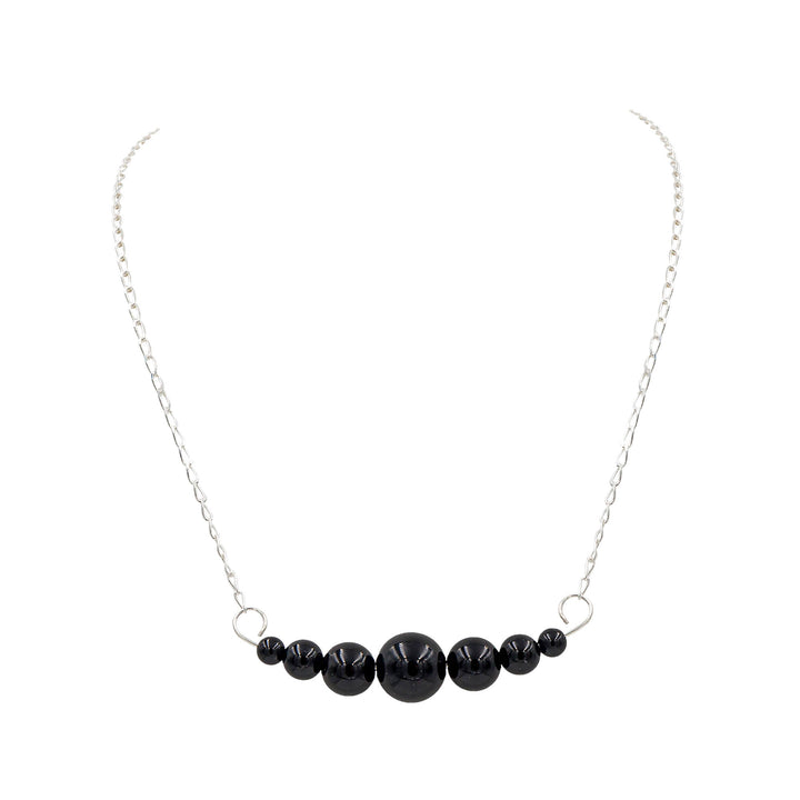 Earth Song Jewelry ~ Midnight black Onyx stones hooked on to your Dangles Sterling Silver necklace chain.