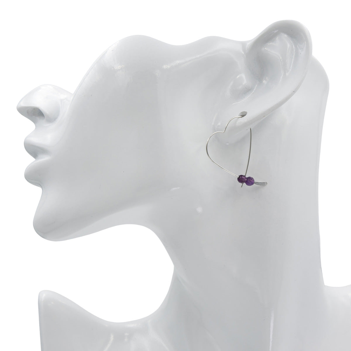 Earth Song Jewelry Handmade Sterling Silver Heart Earrings with faceted Amethyst stones on mannequin head