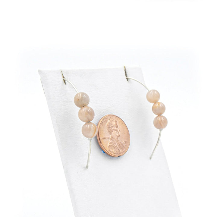 Earth Song Jewelry - Handmade peach moonstone sterling silver curves earrings