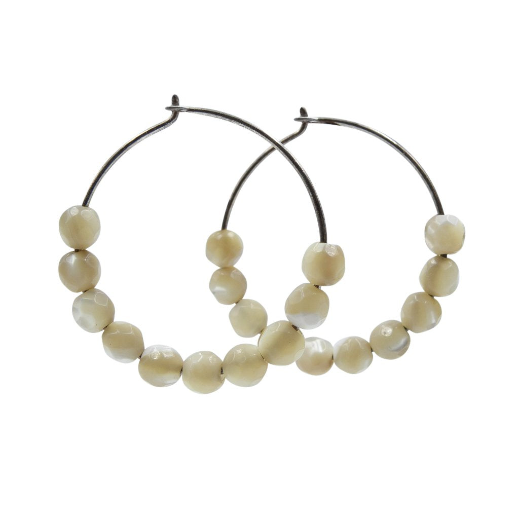 Earth Song Jewelry handmade Luminous Hoops Mother of Pearls earrings. Made with 925 sterling silver plated wire.